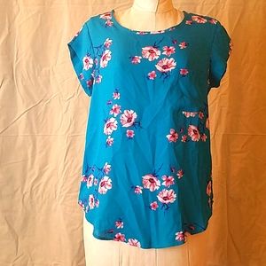 Small teal and floral blouse by Lily White.